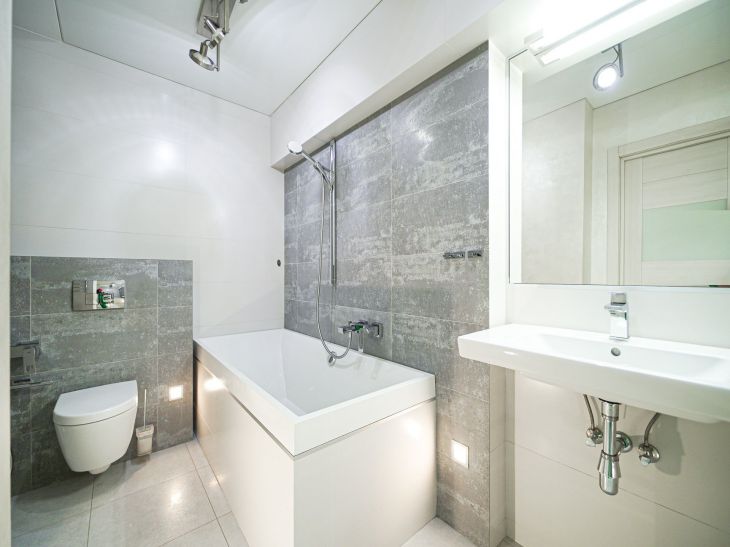 Bathroom arrangement in a two-room apartment: what solutions does the designer offer room