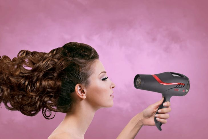 How to Dry Your Hair with a Hairdryer: 10 Beauty Secrets young woman
