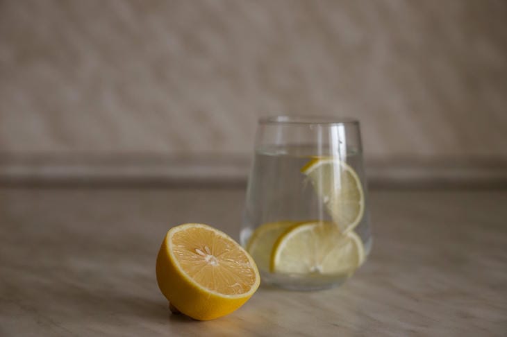 How Much Water Should You Drink Per Day? 7 Signs of Dehydration cup