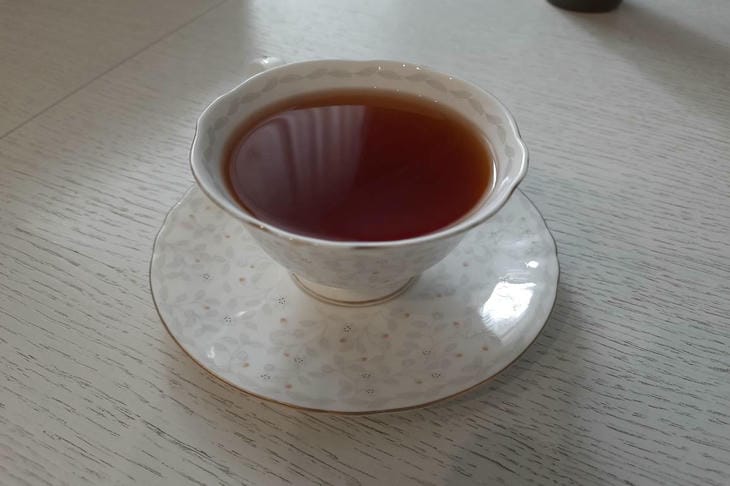 Why is milk often added to black tea? tea